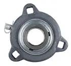 Rock Solid 15/16 Inch Bore Three Bolt Flange Bearing Cast Iron Housing Set Screws Grease Zerk top view of bearing with grease port.