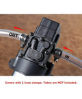 Close-up of bayite 12V DC Water Transfer Pump with 2 hose clamps, showing in and out ports for fluid transfer.
