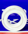 Front view of 7902 Angular Contact Full Ceramic Bearing 15x28x7mm on a blue background.