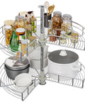 28 Inch Kidney Shaped Chrome Pie Cut Lazy Susan Corner Organizer For Kitchen Base Cabinets With 270 Degree Rotation And Telescoping Mount Two Shelf Blind Corner Storage For Pots Pans Lids And Containers filled with jars and utensils
