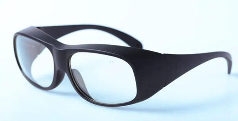 Premium Laser Safety Glasses For Beauty Clinics Loaded With Heavy Duty Armor Against Co2 And Erbium Lasers At Two Thousand Seven Eighty And Twenty Nine Four Zero Nanometers While Guaranteeing Snappy Vision When Things Get Hot, black frames.