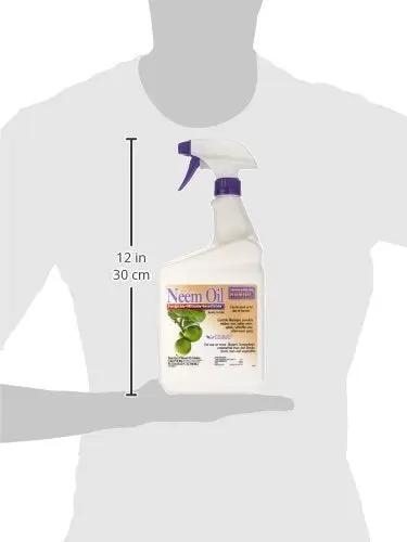 Top Shelf Ready To Use Neem Oil Garden Spray, Heavy Duty Multi Purpose Fungicide Insecticide And Miticide, 32 Ounce Bottle held in hand.