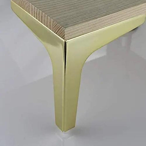 Close-up of Built Tough Gold Trimmed Tripod Furniture Legs With Thick Triangle Base for Coffee Tables, showcasing sturdy construction.