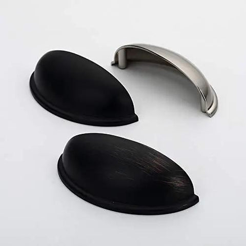 Killer Eight Pack Slick Cup Pull Handles For Vintage Farmhouse Kitchen Cabinets And Dresser Drawers In Drop Dead Beautiful Oil Rubbed Bronze With Three Inch Screws Spacing And Solid Zinc Construction For Fast Refresh Projects, two cup handles in black and silver finishes.