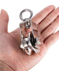 40mm Cable Pulley Wheel, Bearing Inside, held in hand, showing size, made of 45# steel with nickel finish for gym and DIY projects