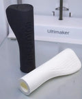 Premium Adjustable Flex Tpu 95A Black 2.85Mm 2000G 3D Printer Filament custom grips shown in black and white on a printer.