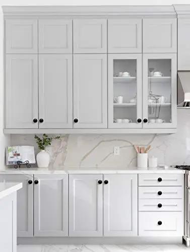 Kitchen cabinets featuring Dang Slick Matte Black Finish Round Cabinet Knobs Zinc Hardware, enhancing a modern grey cabinetry design.