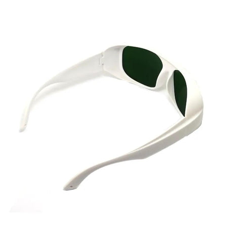 Top Shelf Infrared Laser Safety Glasses Built Different For Total Nd Yag Defense Across 720 To 1100Nm Ranges With Crisp Clear Optics And Rock Solid Od7 Plus Lens Shield, white frame with dark green lenses.