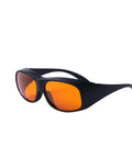 Heavy Duty Laser Safety Glasses With Top Shelf OD5 Protection Covering 180 To 540 Nm Wavelengths Clear Lens side view with orange lenses.