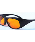 Heavy Hitter Laser Safety Glasses With OD5 Filter Blocking Violet Blue Green Lasers Built Different Construction with orange lens.