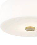 Close-up of Sophie 2 Light Flush Mount Ceiling Light in aged brass, part of dope modern fixture, bottom view, 11.75 inches wide.