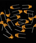 Badass 360 Piece Multilayer Ceramic Capacitors Assortment Kit 18 Values Heavy Duty NPO COG Caps 5Pf To 820Pf showing yellow ceramic capacitors.