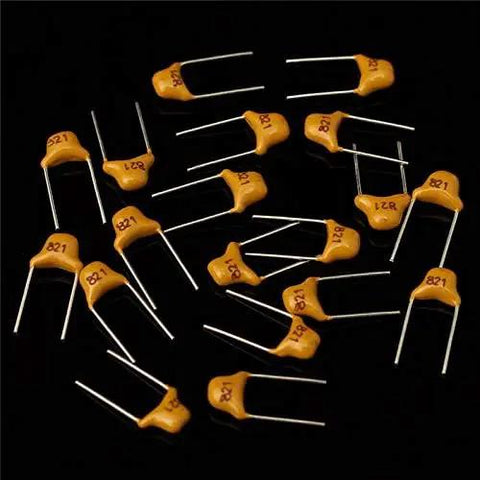 Badass 360 Piece Multilayer Ceramic Capacitors Assortment Kit 18 Values Heavy Duty NPO COG Caps 5Pf To 820Pf showing yellow ceramic capacitors.