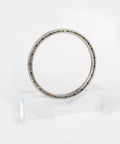 Premium Thin Section Ball Bearing With Integrated Seal Straight Up Precision Angular Contact Design Heavy Duty Build For Robotics And Automation 110 By 126 By 8 displayed on a stand.