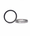 Top Shelf 50 Piece Set Of Abec Three S6703 Two Rs Stainless Steel Thin Wall Deep Groove Ball Bearings 17 By 23 By 4 Millimeters Sealed Smooth Spinning Rollers on white background.