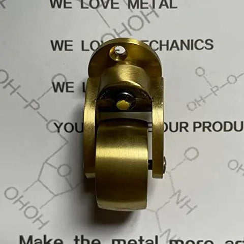 Heavy Duty Solid Brass Swivel Castor Wheels With Slick 360 Rotation And Dope Antique Vintage Gold Finish Easy Peasy Furniture Caster Replacement Kit For Couches Chairs Cabinets shown from front angle.