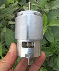 Top Shelf 12V 775 DC Micro Motor Delivering Knockout Torque On Dual Shafts For Real Heavy Duty Power Tool Mods And Custom Robot Rigs Built To Dominate, hand held silver motor