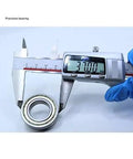 Built Tight And Smooth Rolling Rock Solid 6904zz Thin Section Ball Bearing Kit Abec One Precision Deep Groove Roller being measured with calipers.