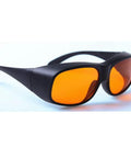 Heavy Hitter Laser Safety Glasses With OD5 Filter Blocking Violet Blue Green Lasers Built Different Construction, black frame with orange lenses.