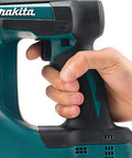 Close-up of hand gripping the handle of a Built Different Heavy Duty 18 Volt Cordless Brad Nailer for easy control.