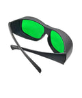 Hella Super Slick Dual Wave Laser Blocking Shades For Red And Infrared Beams Wavelengths Od3 Plus And Od5 Plus in black with green lenses.