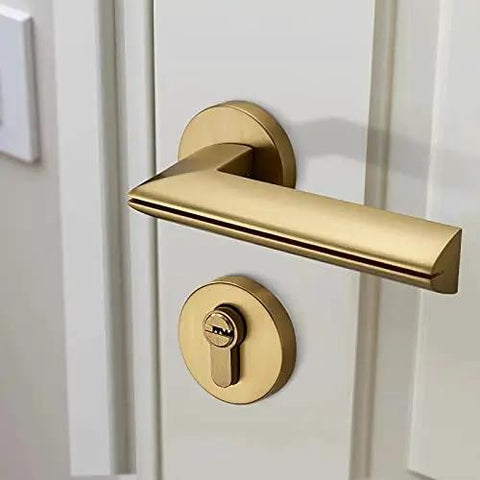 Rock Solid Heavy Duty Zinc Alloy Door Handles With Slick Electroplated Gold Finish For Interior Door Locks Badass Cabinet Pulls And Wardrobe Cupboard Furniture Hardware Upgrades Built To Last Forever mounted on a white door.