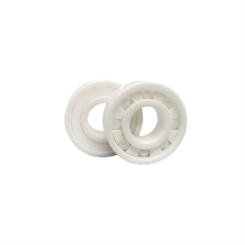 Chromium Steel Rear Wheel Bearing Drop In Replacement Built Damn Tough With Zero Play And Heavy Duty Load Capacity For Fresh Automotive Projects And Heavyweight Rides Top Notch Specs, two white bearings.