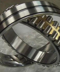 Heavy Duty STC Steyr Spherical Roller Bearing 500x830x325mm CA K30 C3 W33 with cylindrical rollers and steel rings.