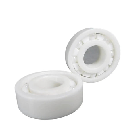 Full Zirconia Ceramic Ball Bearings 6209 Smooth Dry Running Motor Grade 45X85X19 Millimeter showing two white bearings.