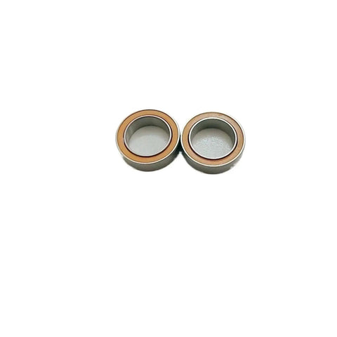 Top Shelf ABEC 7 Precision Hybrid Ceramic Ball Bearings 7X13X4mm with stainless steel seals, showing two bearings.