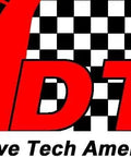 Logo of Drive Tech America featuring bold red letters DTA on a black and white checkered background.