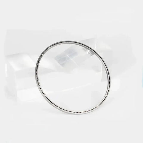Ultra Thin Sealed Ball Bearing High Precision Angular Contact Type For Robotics And Automation Built To Handle Cramped Layouts Like A Champ Runs Smooth Under Pressure Makes Tight Installations A Breeze, showing a thin ring design.