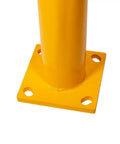 Close-up of yellow base of Two Pack Rugged Industrial Grade High Profile Steel Guard Rail Safety Barrier with bolt holes, floor-mounted