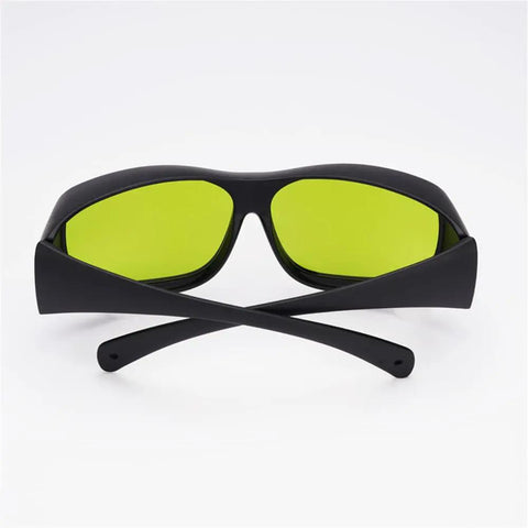 Big Deal Ipl Laser Safety Glasses With Od7 Plus Lens For Spa Owners And Laser Pros Offering Killer Eye Shielding From Eight Hundred To One Thousand One Hundred Nm In Solid Green Rims, front view with yellow lenses.