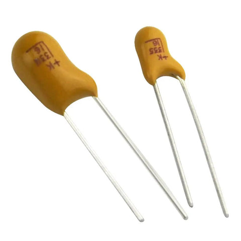 Rock Solid Tantalum Capacitor Assortment Kit Featuring One Hundred Pieces Across Ten Distinct Values Ranging From One To One Hundred Microfarads At Sixteen Volts Inside A Nifty Storage Box - Two yellow tantalum capacitors with lead wires.