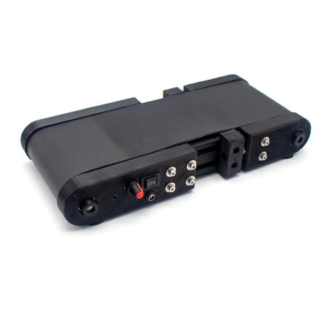 Compact Mini Conveyor Belt With Variable 12V DC Motor Rolling Smoothly Through DIY Builds featuring black motor housing and control buttons.