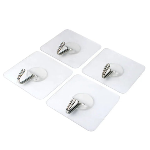 Super Tough Clear Adhesive Wall Hooks 12 Pack Stainless Steel, four clear hooks on smooth surface for easy hanging.