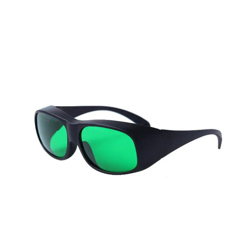 Badass Red Laser Protective Glasses With Heavy Duty OD6 Plus Optical Density Coverage For 620 To 700 Nm Wavelengths And Premium Clear Lens Safety Optics For Workshops And Labs, with green lenses and black frame, angled view.