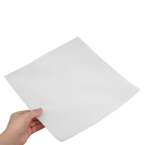 A hand holding a White EPE Foam Packing Pouch from the 25 Pack Shockproof Cushion Bags For Fragile Dishes And Glassware.