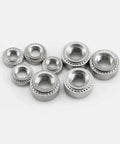 50 Pack M3-1mm CLS Self Clinching Nut Inserts 304 Stainless Steel round head nutserts of varying sizes on a white background.