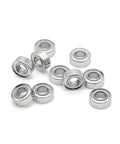 10 Pack MR85ZZ Double Shielded Bearings 5 By 8 By 2 Point 5 Millimeter ABEC 7 Chromium Steel shown in a scattered arrangement.