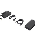Rock Solid Thunderbolt 4 Dock With 100w Charging And 4k Screen Support featuring a black power adapter and multiple cables.
