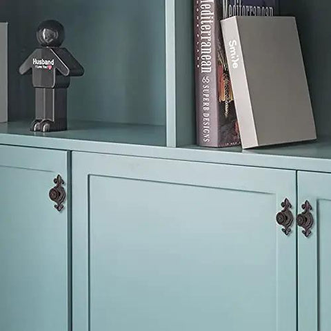 Top Notch Black Antique Mushroom Dresser Knobs With Decorative Zinc Backplates - 12 Pack on teal cabinet with books.