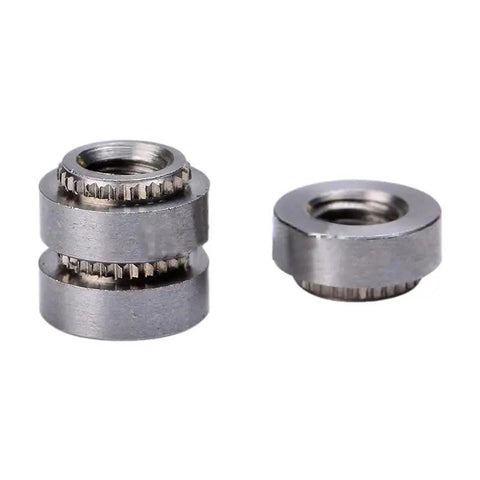Top Notch M3 Stainless Steel Self Clinching Rivet Nut Fasteners in close-up, displaying two precision thread nuts for heavy-duty use.