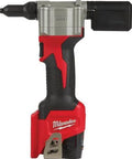 Pro Grade M12 Cordless Rivet Gun Kit Featuring Dual Batteries Smart Charger And Rugged Case Heavy Duty Pull Setup Designed For Stainless Steel Fasteners Rock Solid Job Site Workhorse, side view showing ergonomic design.