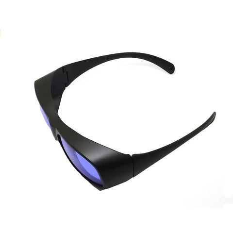Kickass Laser Safety Glasses Optical Density Four Plus For 585 And 595 Nm Pulsed Dye Lasers Clear Polycarbonate Lenses angled view.
