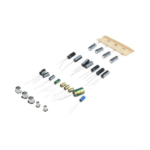 Top Shelf Motherboard Repair Kit With Assorted Capacitors showing 25 assorted capacitors with clear value markings for electronics repair.