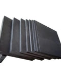 Beefy Two Pack Carbon Graphite Electrodes Rock Solid Pyrolytic Sheets For Electrolysis And High Temperature Foundry Work showing heavy-duty black graphite sheets stacked at an angle.