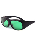 Heavy Duty Laser Protective Glasses Provide Knockout Eye Defense For Red Semiconductor Projects And Nd Yag Workshops With Straight Up Comfort Seal Optical Density Filter, black frame with green lenses.