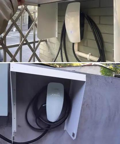 Real Deal Outdoor EV Charger Wall Mount Enclosure With Waterproof Cover And Tough As Nails Cable Protection Box mounted on a wall.